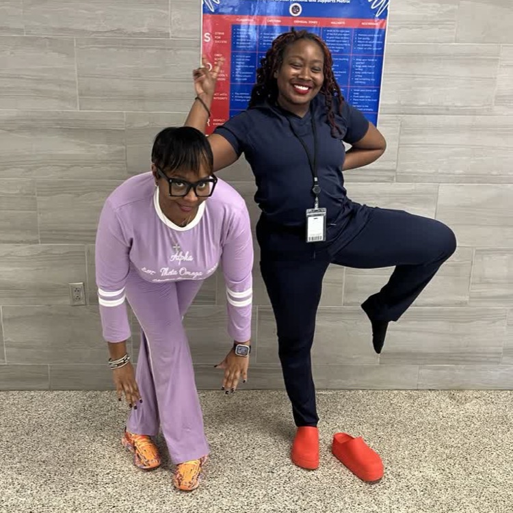 several teachers posing in athletic wear