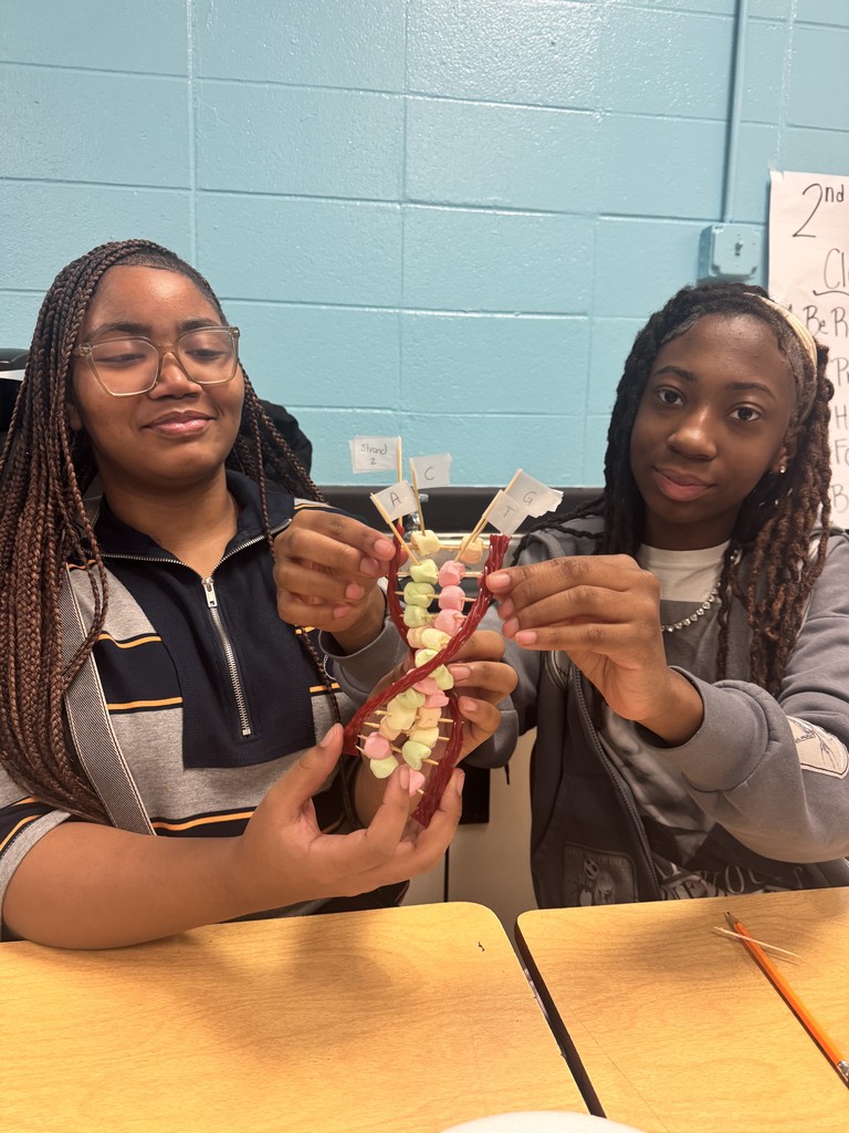 Students showing off their finished work