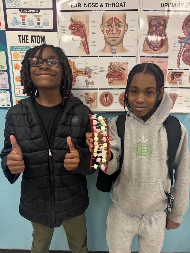 Students showing off their work