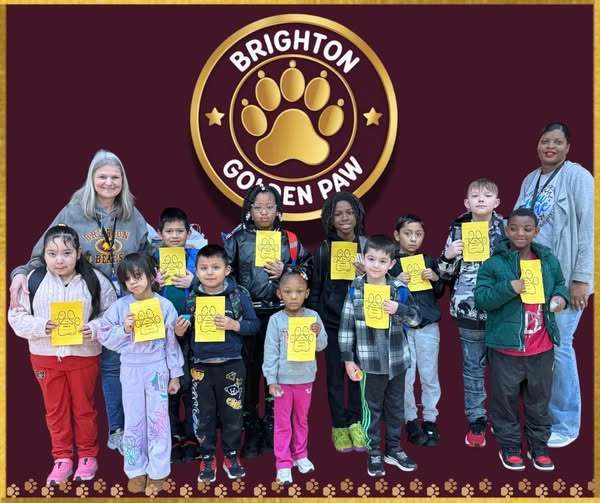 students and teachers smiling