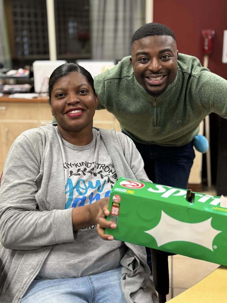 teacher and students smiling