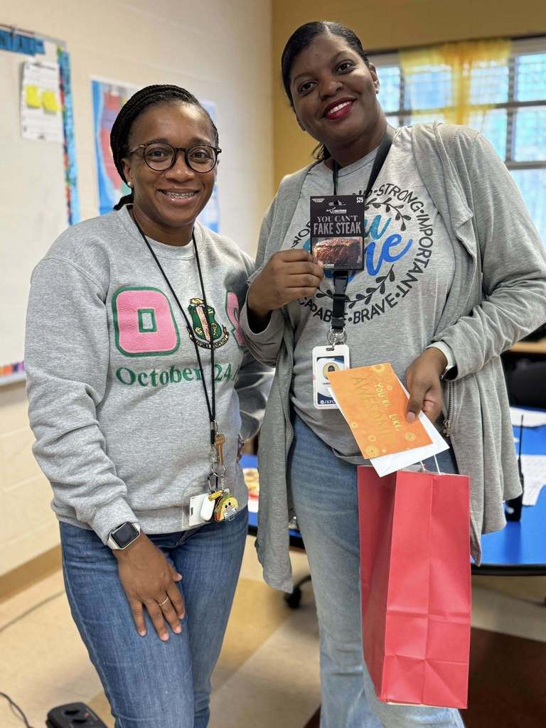 teacher and students smiling