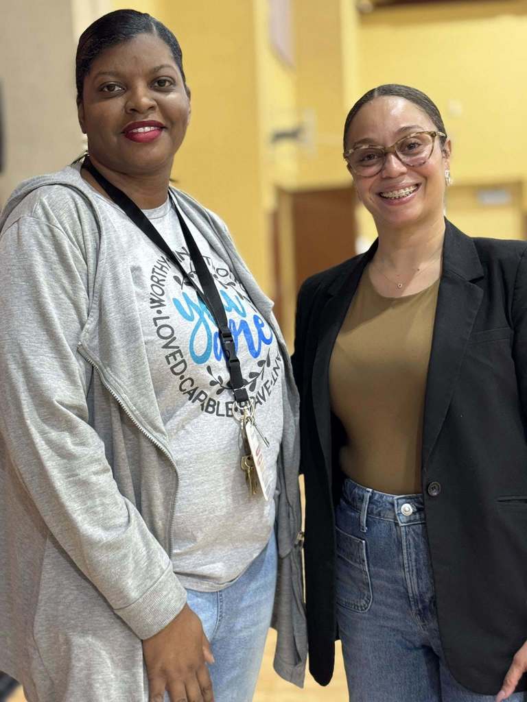 teacher and students smiling