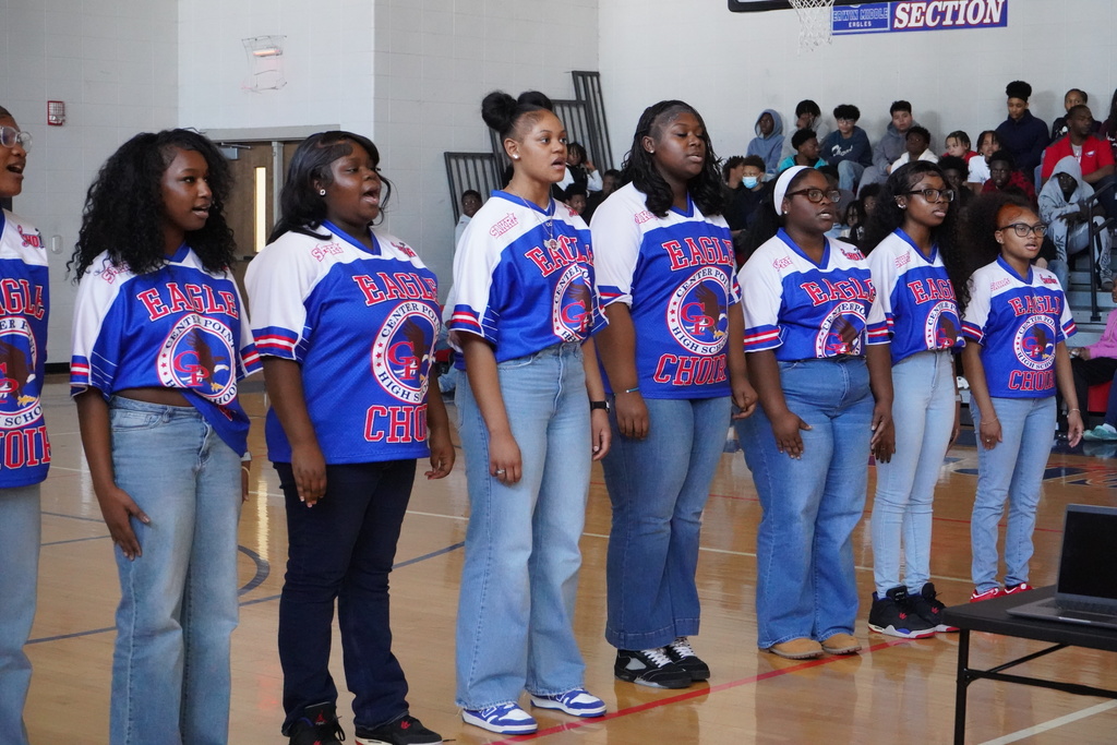 Center Point High School's Chorale sings in front of Erwin Middle School students inside Erwin Middle School's gym.