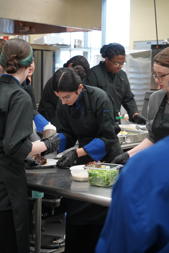 JEFCOED Culinary Arts students work inside a kitchen.