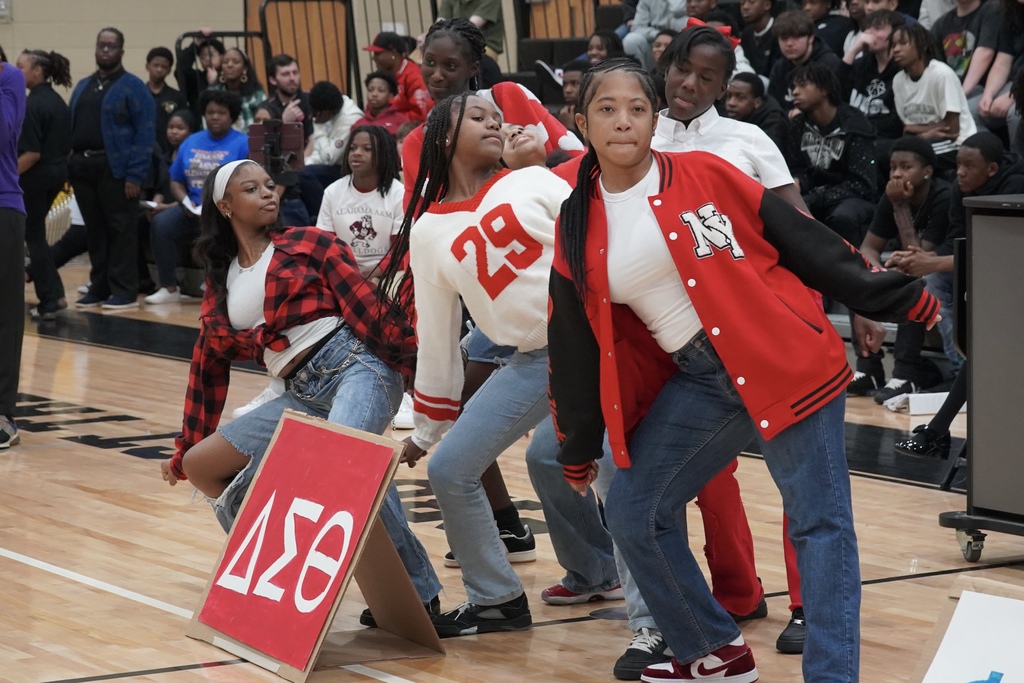 Students dressed as sorority members put on a performance inside McAdory Middle School's gym.