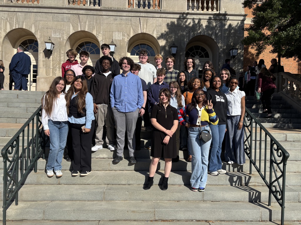 students standing on steps outside the courtroom on a field trip