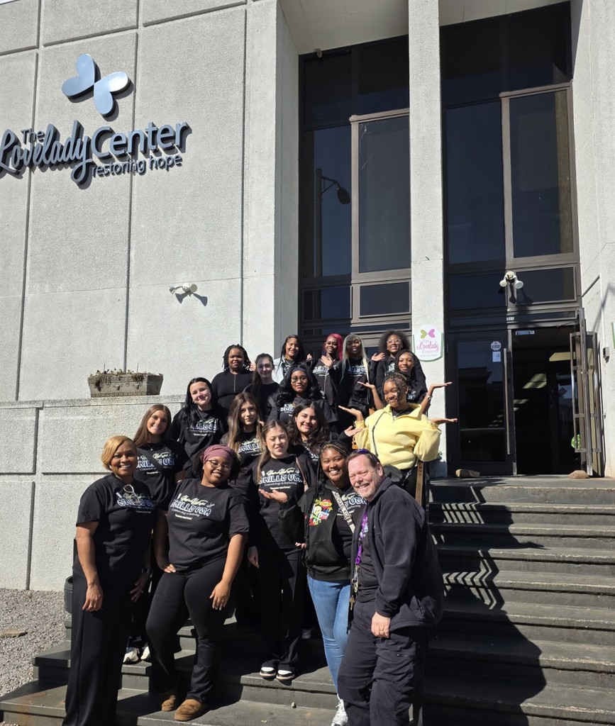 Hueytown High School cosmetology students stand together for a photo with their instructors outside the Lovelady Center.