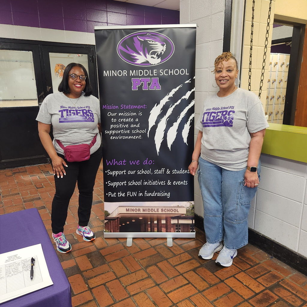 Two dedicated members of Minor Middle's Parent Teacher Association. The PTA helped with the Parent Night by answering questions and providing concessions.