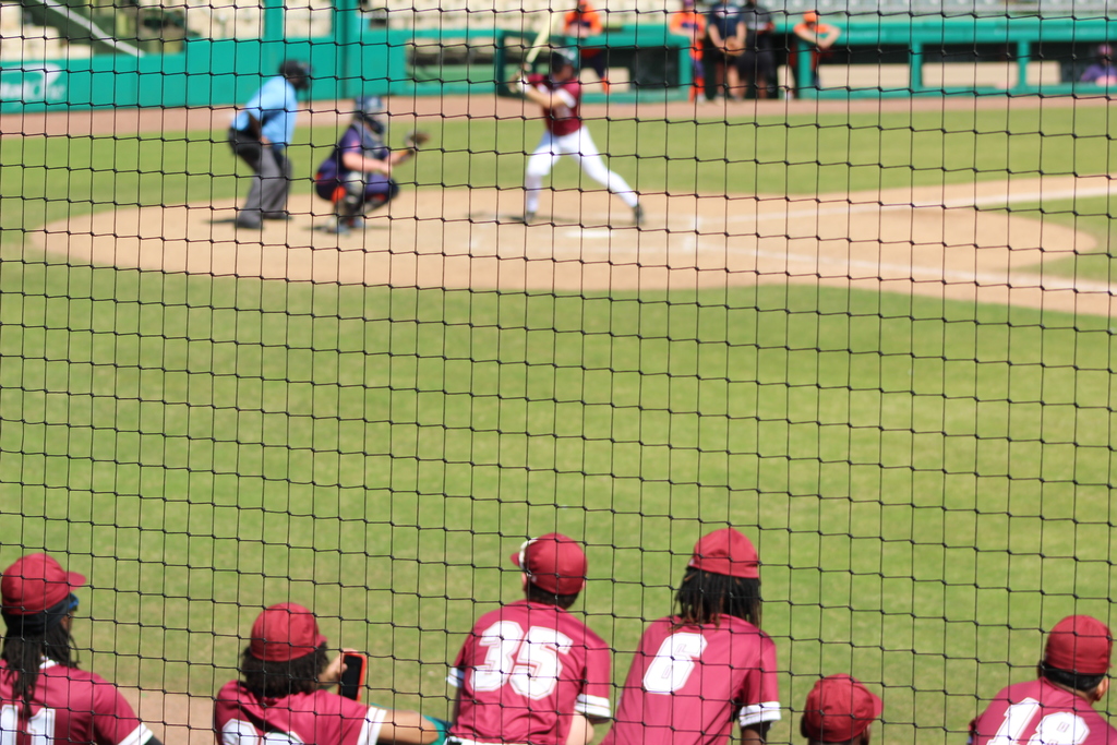 The Shades Valley high school baseball team looks on from the dugout as one of their teammates is up to bat. They are participating in the 4th Annual Rickwood Classic at Historic Rickwood Field in Birmingham, AL.
