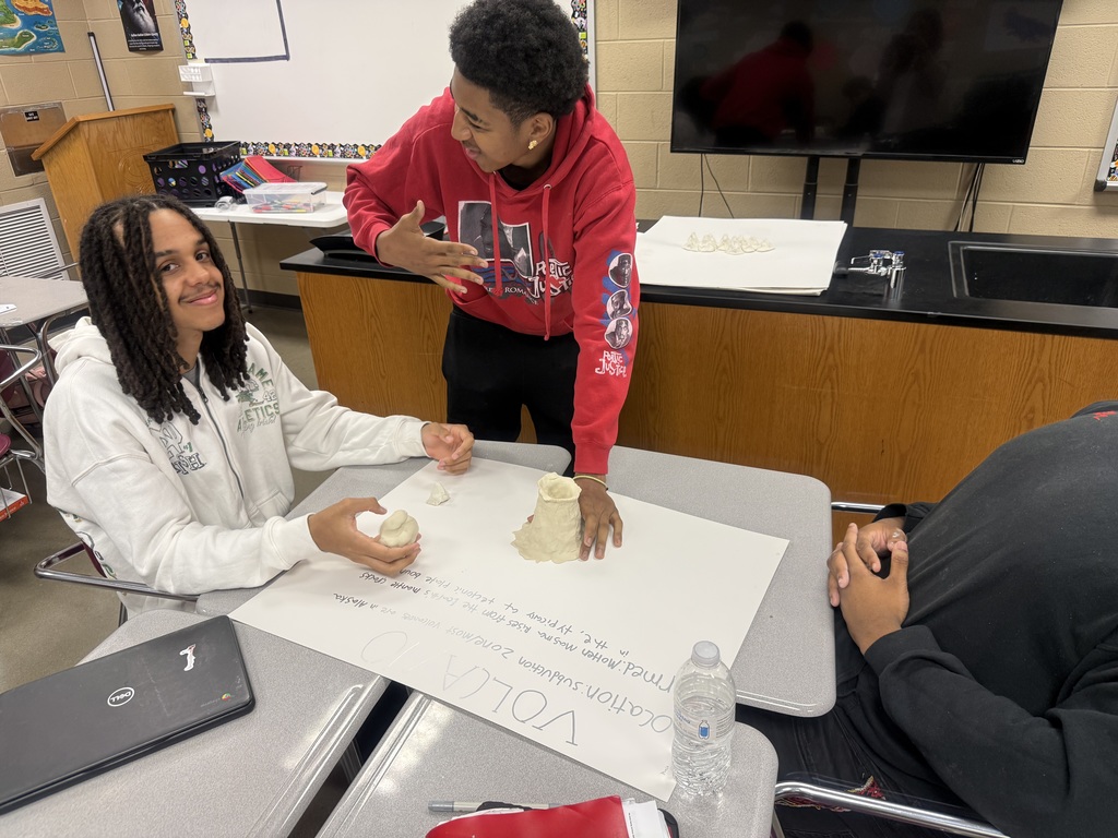 Coach Hall's Class making land formations using clay pic 5