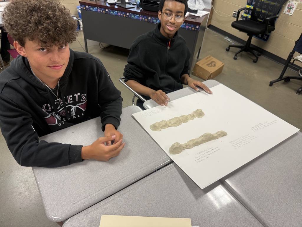 Coach Hall's Class making land formations using clay pic 4