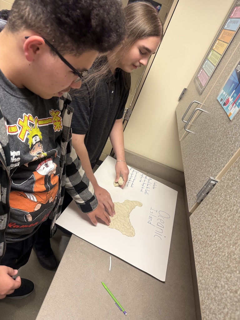 Coach Hall's Class making land formations using  clay pic 1