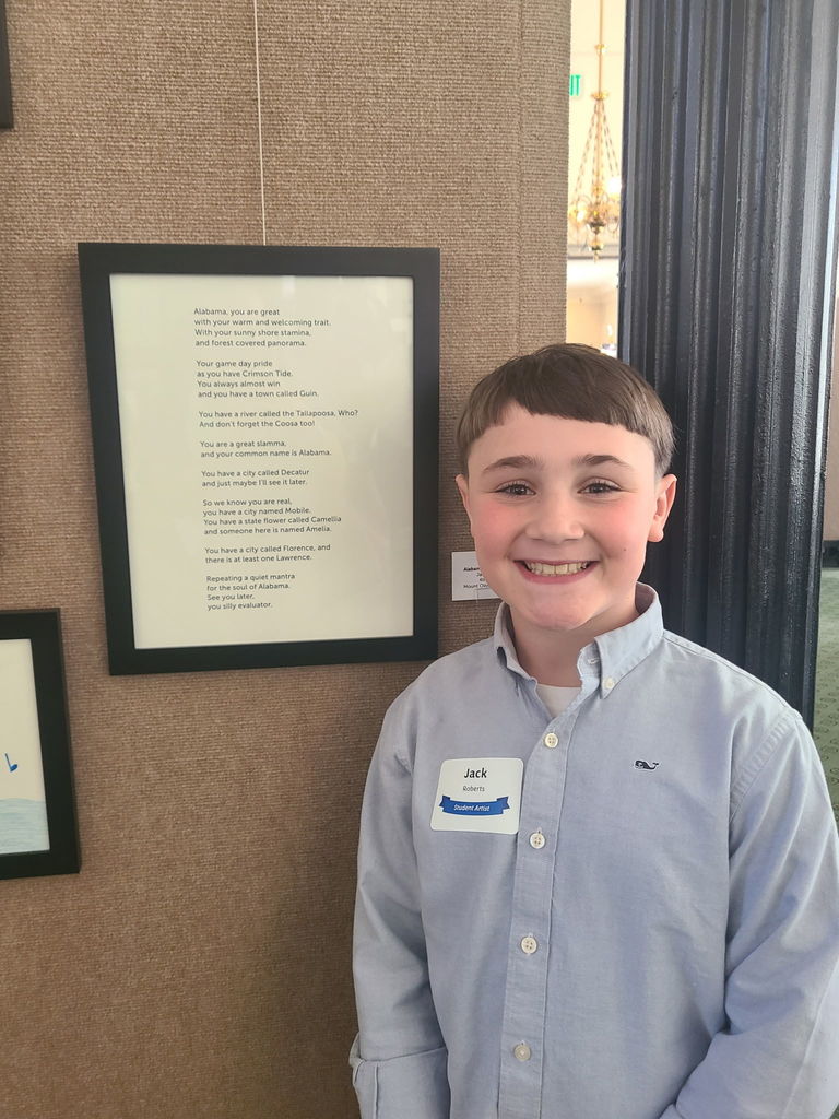 Poetry winner and Poem honored at recpetion in Montgomery. Student featured with poem.