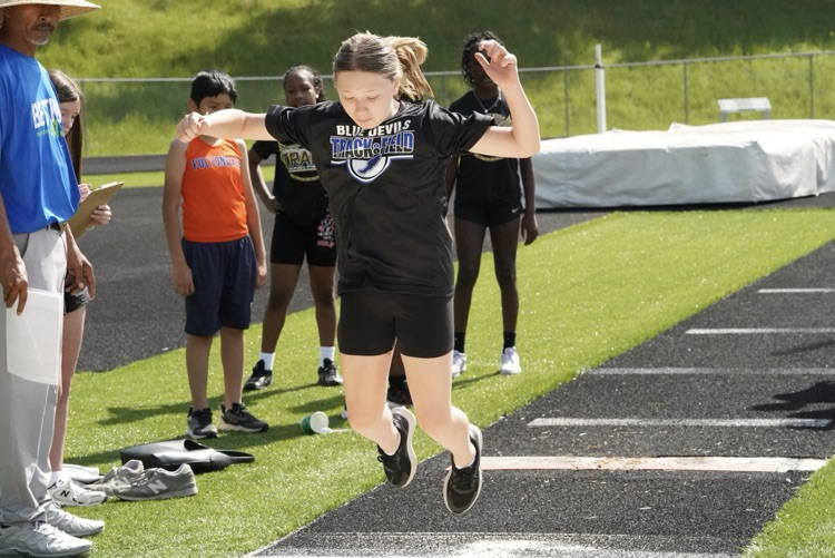 A North Jefferson Middle School student competes in long jump at JEFCOED 6th Grade Track and Field Championship.
