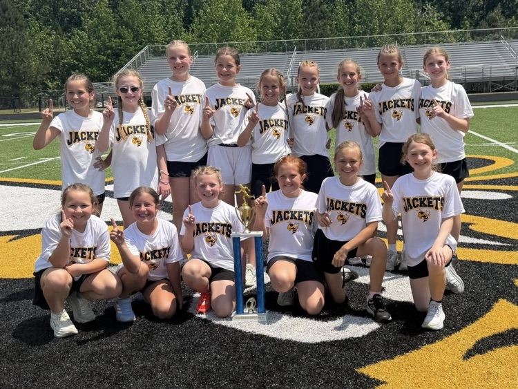 The Bagley/Corner track team poses for a photo with their trophy from the JEFCOED track and field play day.