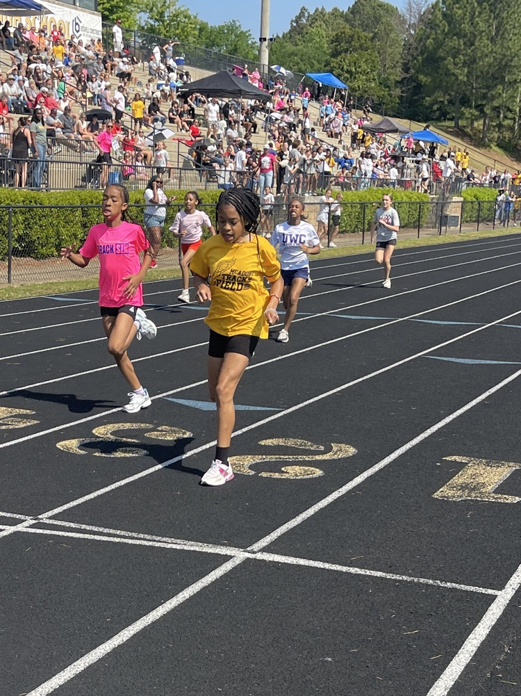 Students run down the track during the JEFCOED track and field play day.