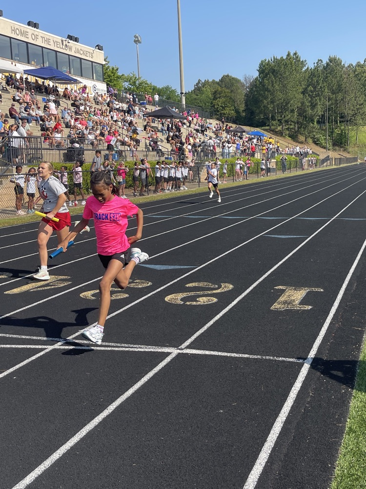 Students run down the track during the JEFCOED track and field play day.