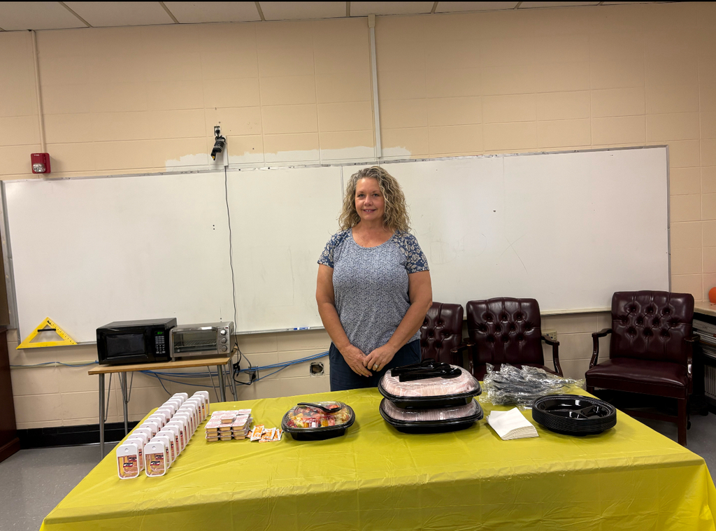 Mrs. Angie from AmFirst Credit Union brings Chick-fil-a breakfast and goodies to teachers for Teacher Appreciation Week.