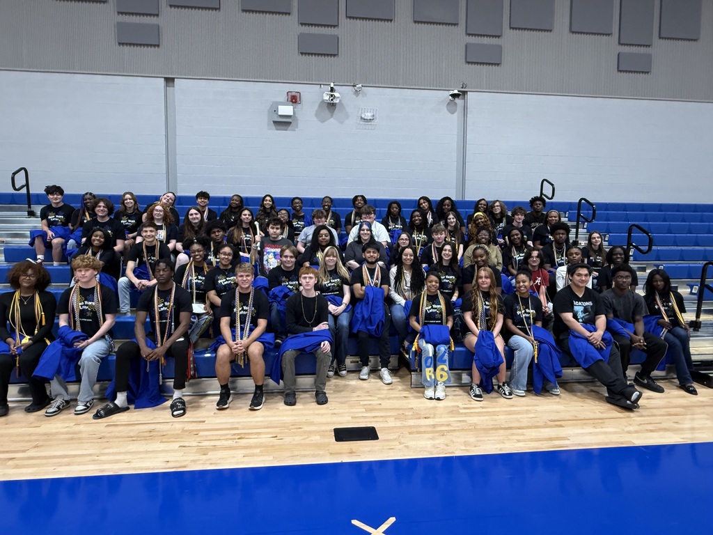 class of 2027 graduates sitting as a group prior to the ceremony