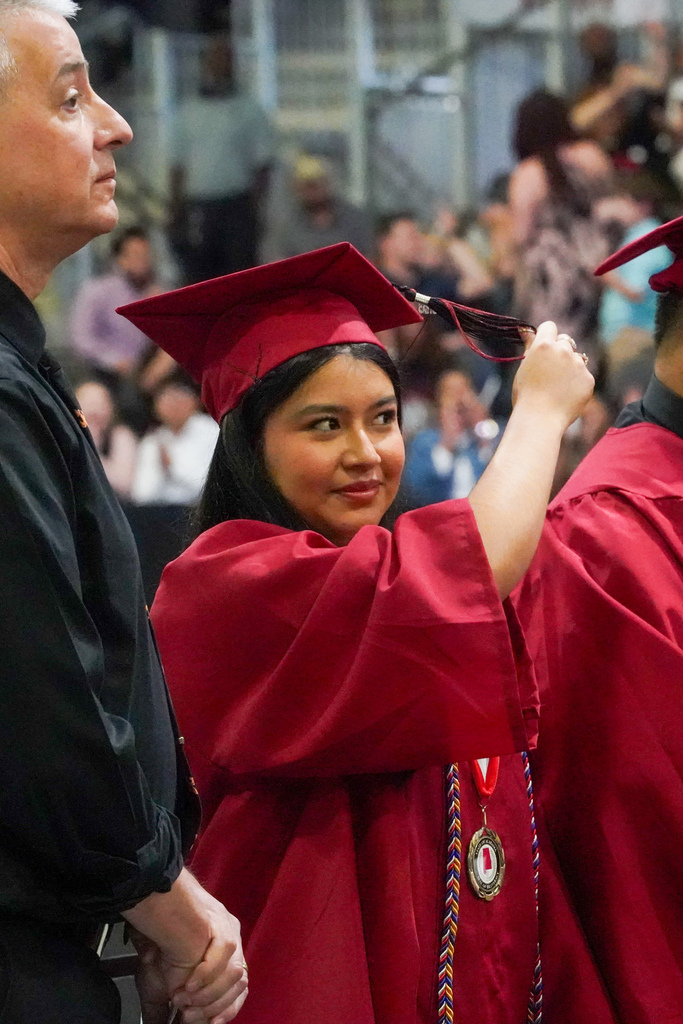 A girl turns her tassel during the Shades Valley High School graduation ceremony.