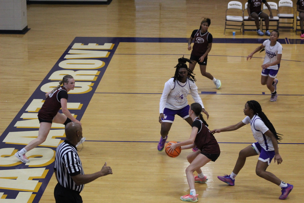 A Gardendale Girls basketball player dribbles the ball during a game against Pleasant Grove.