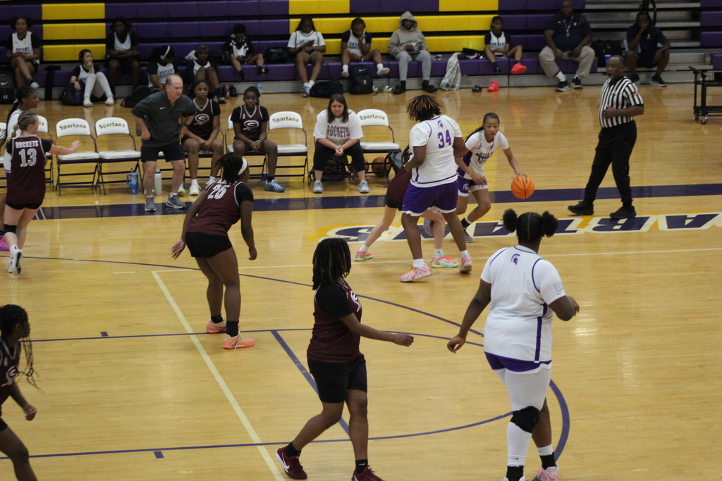 Pleasant Grove and Gardendale High Schools' girls basketball teams play each other on the court.