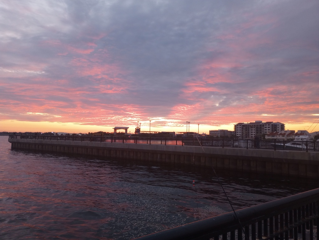 Sunset over Palafox Pier Park in Florida.