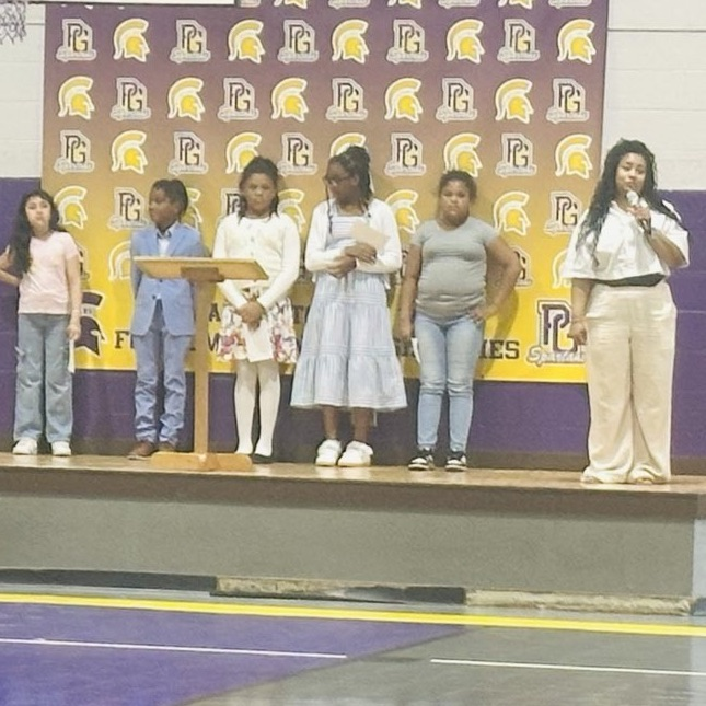 Students who earned an award at SOAR standing on the stage. 