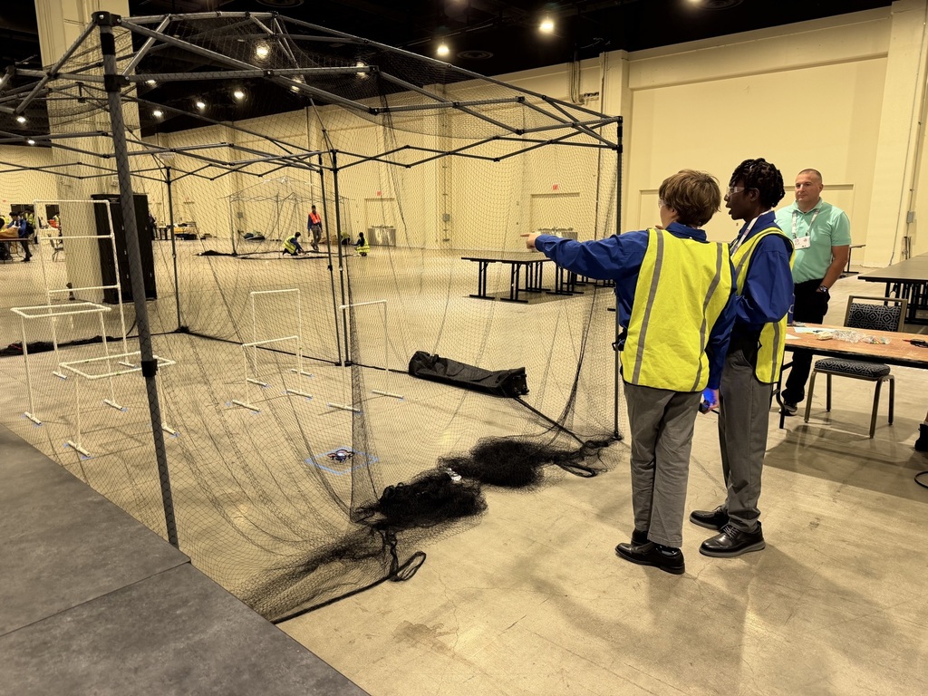 Students compete in a drone flying competition.