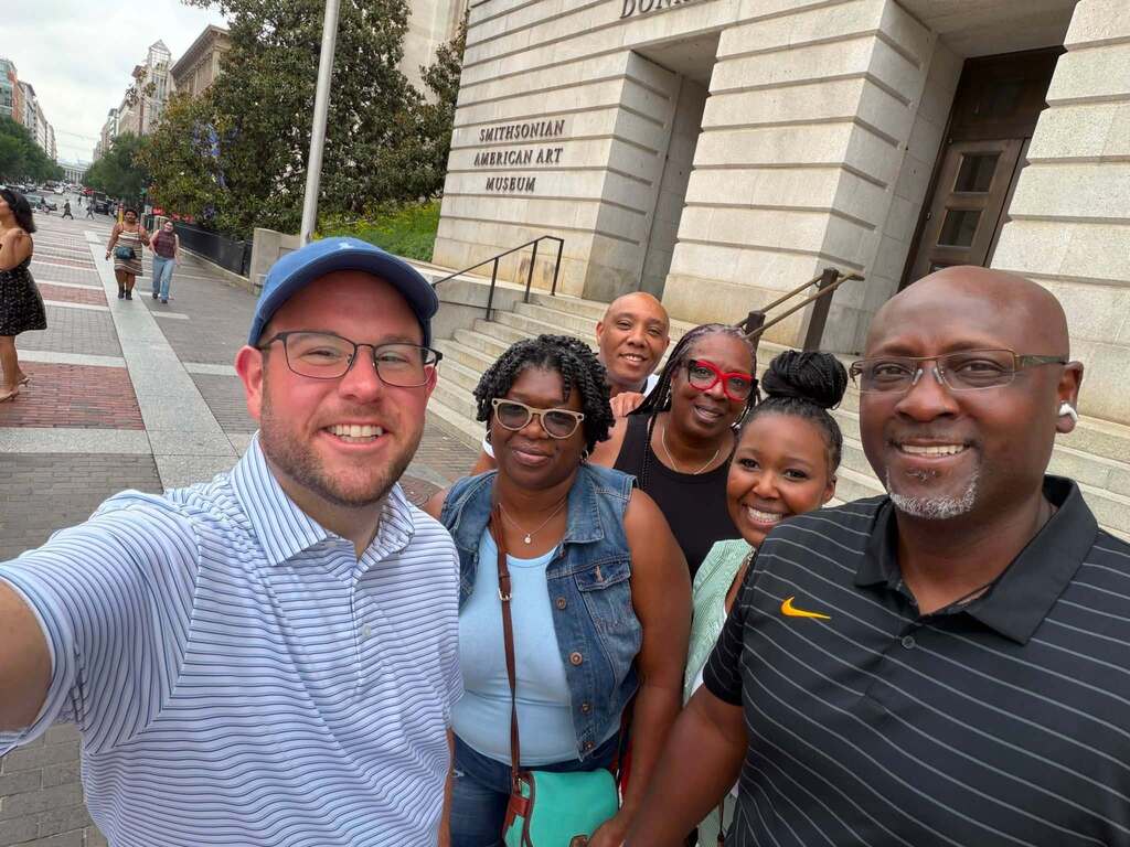 JEFCOED finance instructors and CTE specialist Dr. Chris Shaw pose for as photo outside the Smithsonian American Art Museum.