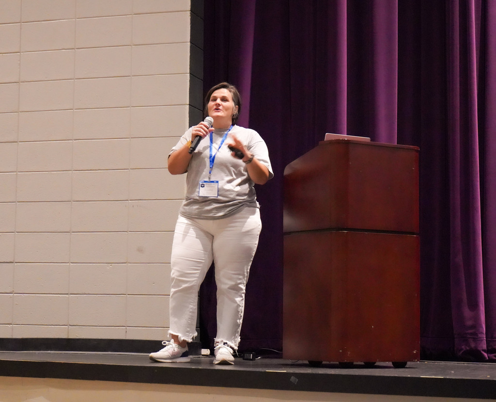 A woman speaks to the audience at the 2025 JEFCOED Leadership Conference. 