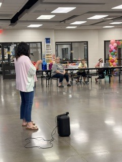 Office coordinator reviewing procedures for money, purchase orders, etc
