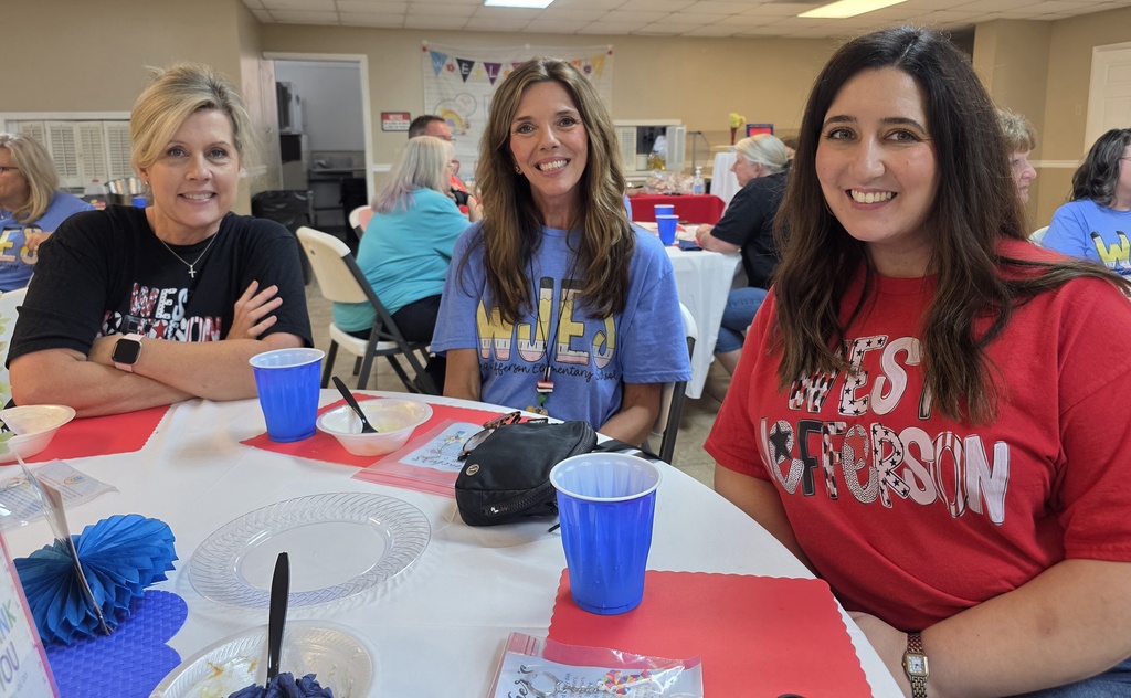 2nd, 1st, and 3rd grade teachers sitting at a table