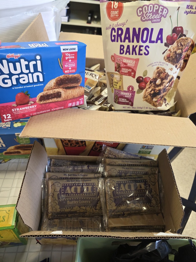 Boxes of granola bars and popcorn
