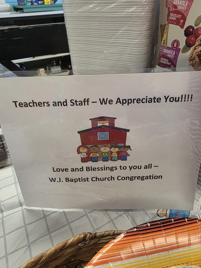 A sign that reads: Teachers and Staff, we appreciate you! Love and blessings to all---W. J. Baptist Church Congregation