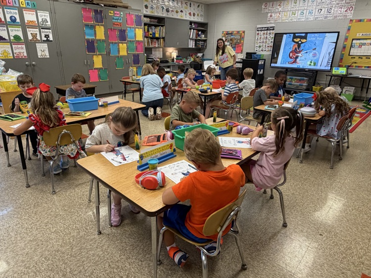 Students coloring at their desks