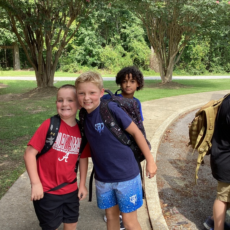 students outside of door on first day 
