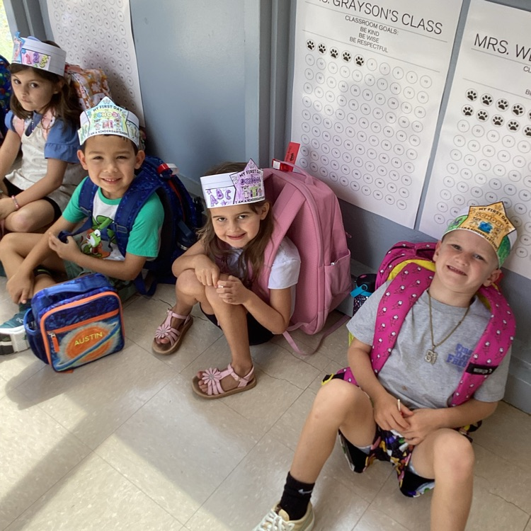 students on first day ready to get picked up in kindergarten line