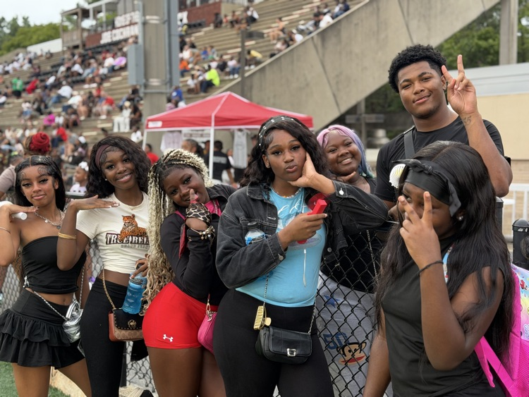a group of students poses for the camera