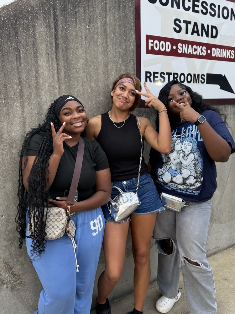 a group of students poses for the camera