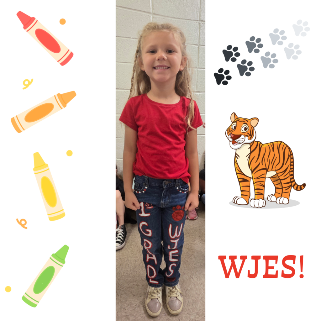 1st grade girl wearing painted pants with WJES on them. Background to picture has crayons, pawprints, a tiger, and WJES