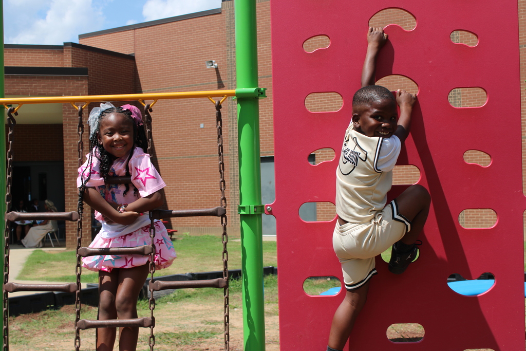 1st grade students playing on the playground