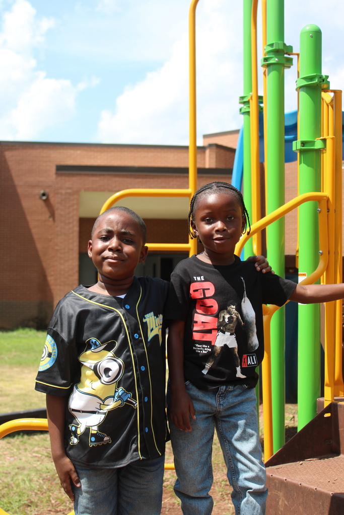2 boys playing on the playground