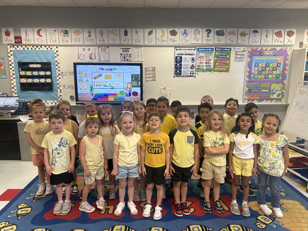 Kindergarten class wearing yellow shirts.