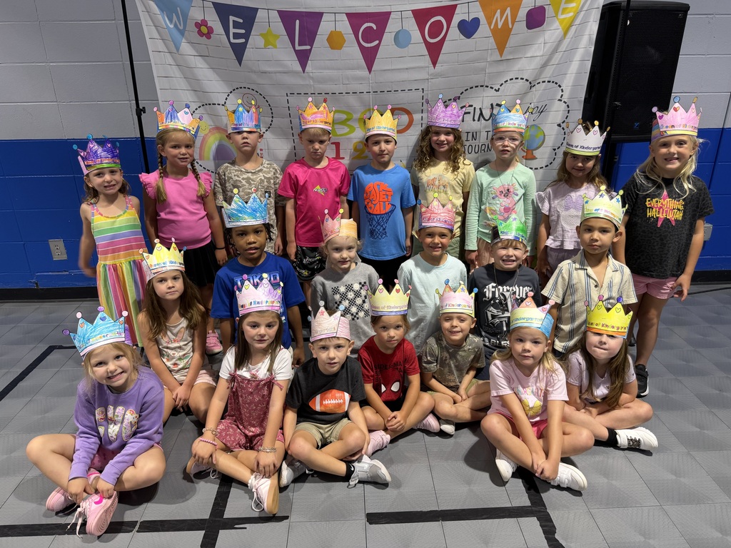 kids in kindergarten wearing crowns on first week of school
