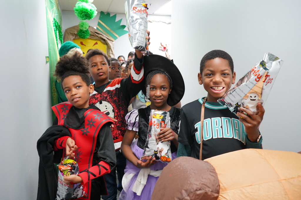 Students and teachers dressed up in halloween costumes