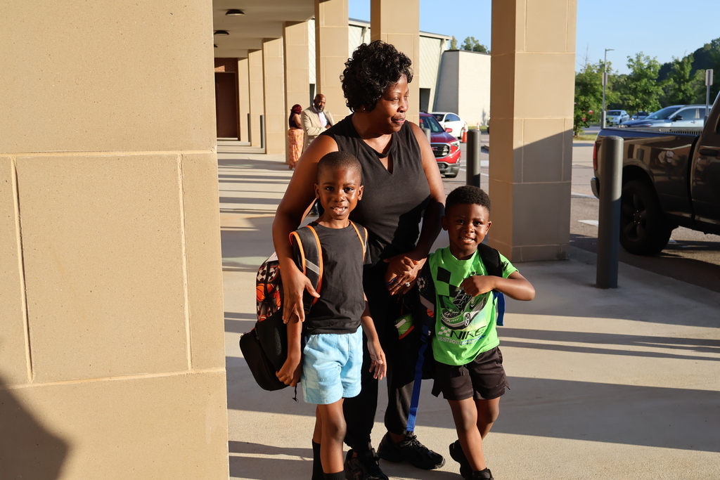 Grandparents greeting students in the morning carline