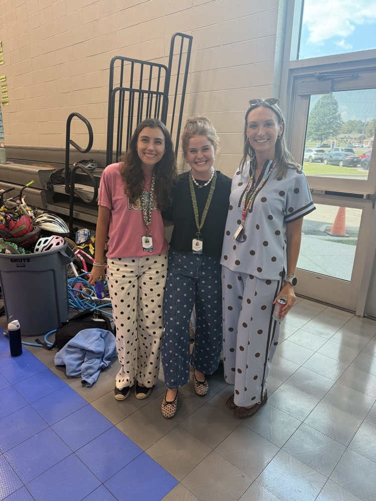 teachers posing together in polkadot clothing