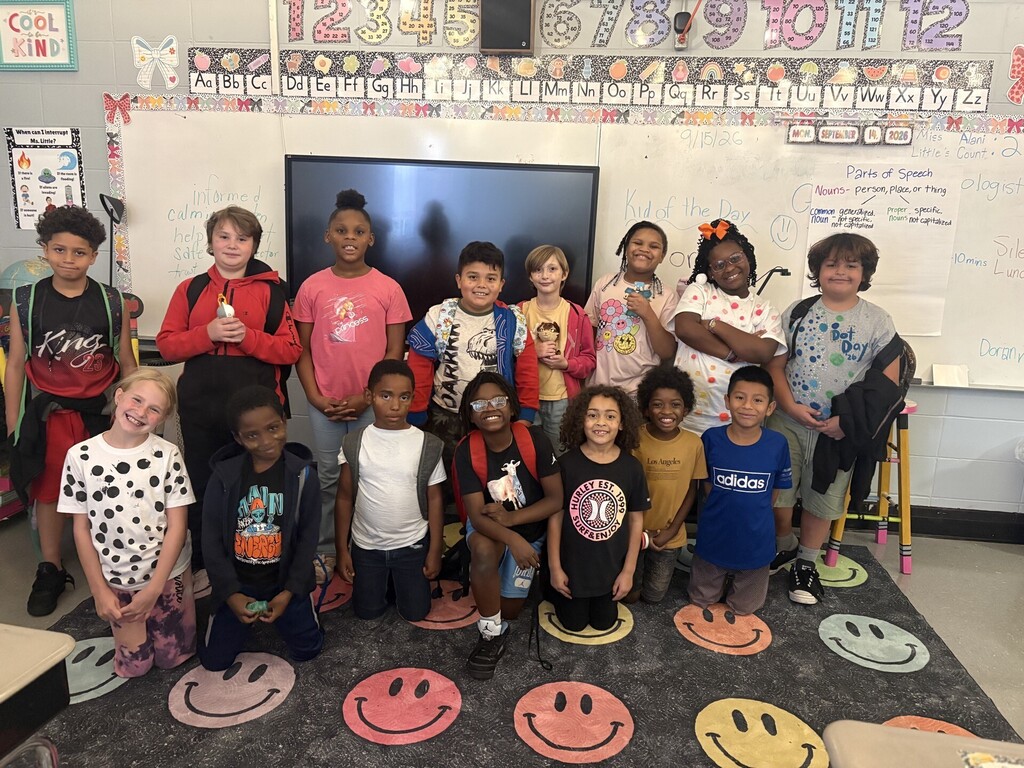 Brookville Elementary teachers and students smile for photos while wearing dots in celebration of National Dot Day.